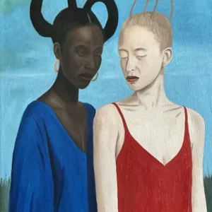 Two women in colorful dresses, serene.