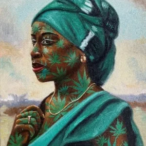 Woman in teal headwrap with leaf patterns.