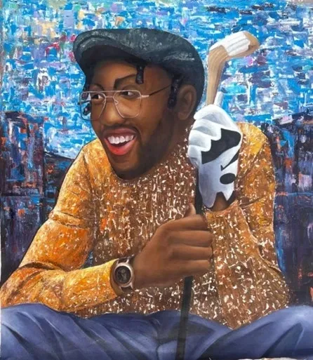 Smiling man with golf club and hat.