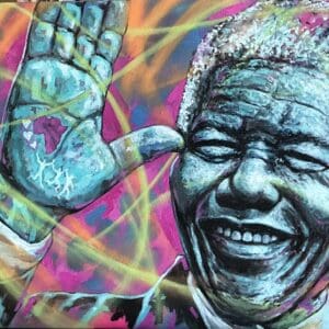 Smiling man with hand painted, colorful background.
